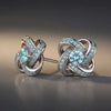 Celtic Knot™ Earrings — 18K White Gold | Aquamarine